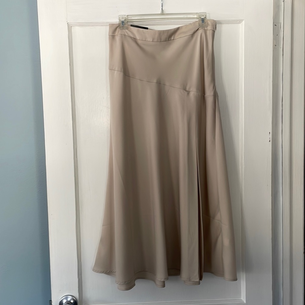 Elegant midi skirt with slit. Never been worn.